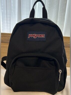 JanSport Half Pint Mini Backpack 
(New without tags)